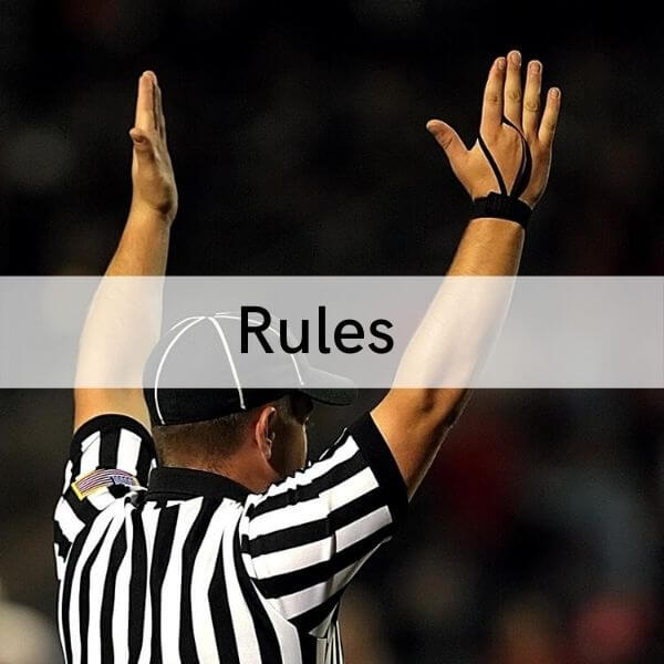 Image of a referee calling a foul to represent the rules of Football Vs Cricket