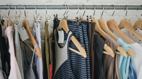 Rainy season clothes are hanging on hangers. Clothes made from lightweight materials.