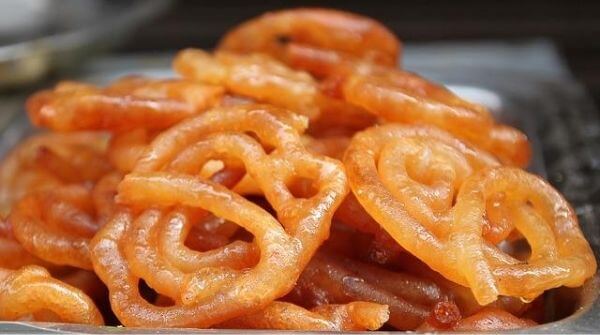 Jalebi is one of the popular sweets in India. It is made with pure ghee, kesar and sugar syrup. This hot piping delicacy is pure love. 