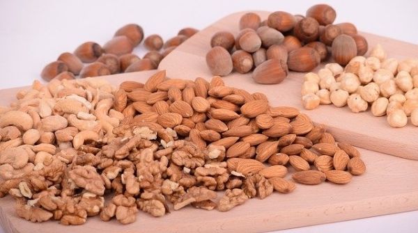Nuts will help with weight loss. Almond, walnuts, brazil nuts, pistachios, etc., are metabolism boosting nuts.