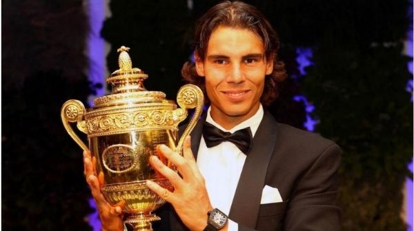 Nadal as the first time champion of Wimbledon holding the trophy after which he won the Australian Open too