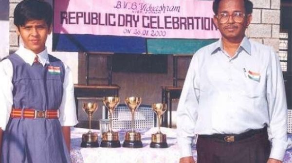Nehwal standing with all her trophies from the school wins